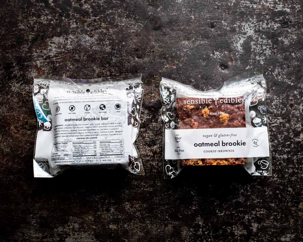  Packaged oatmeal brookie bars showing front and back packaging with nutritional information.