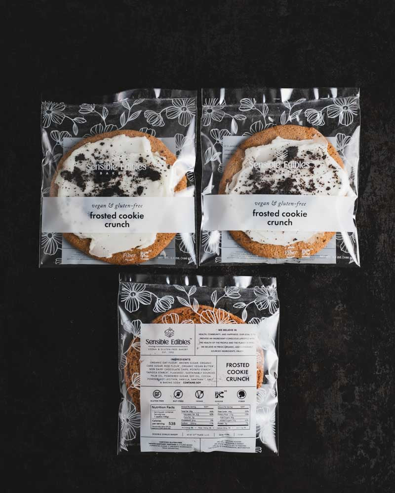 Packaged frosted cookie crunch, labeled and wrapped in clear packaging, including front and back views.
